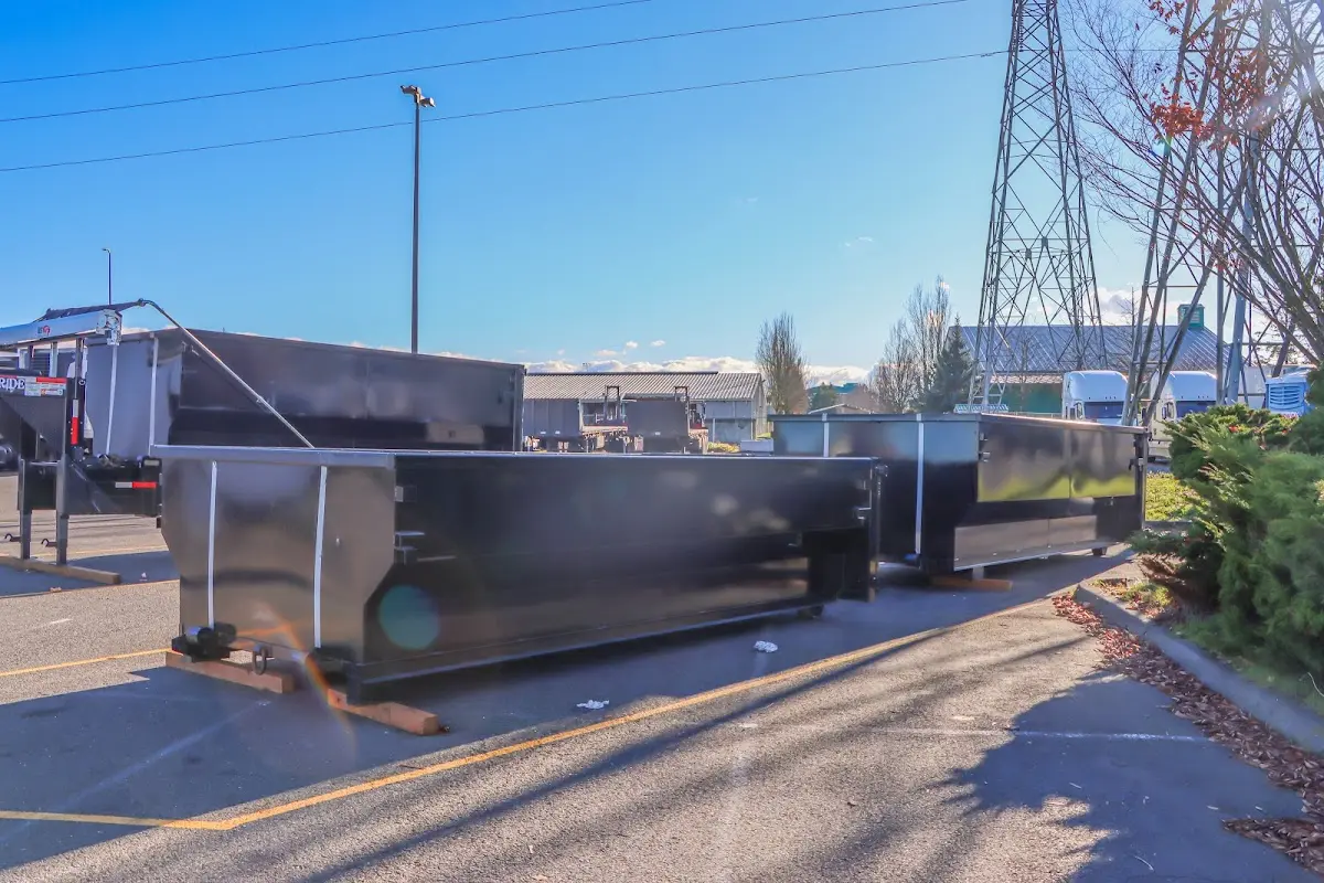 Roll-off dumpster ready for waste disposal at job site for 6 Yard Dumpster Rental in South Hill